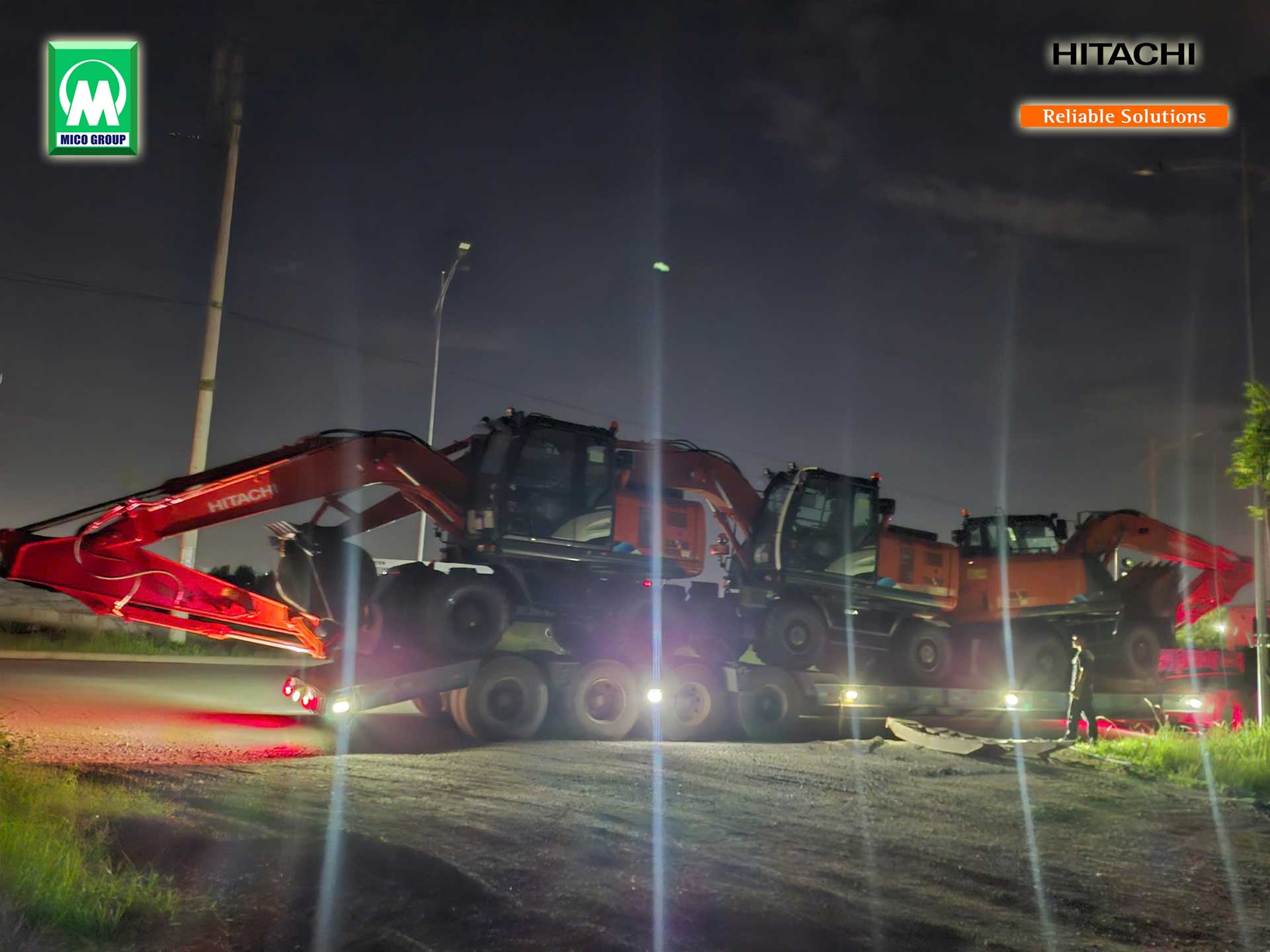 Đào lốp Hitachi ZX170W được vận chuyển đến công trường