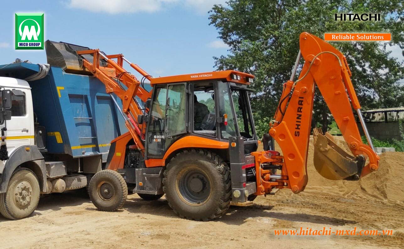 Máy xúc đào liên hợp Hitachi BX100 Shinrai Power xúc đất đổ lên xe ben